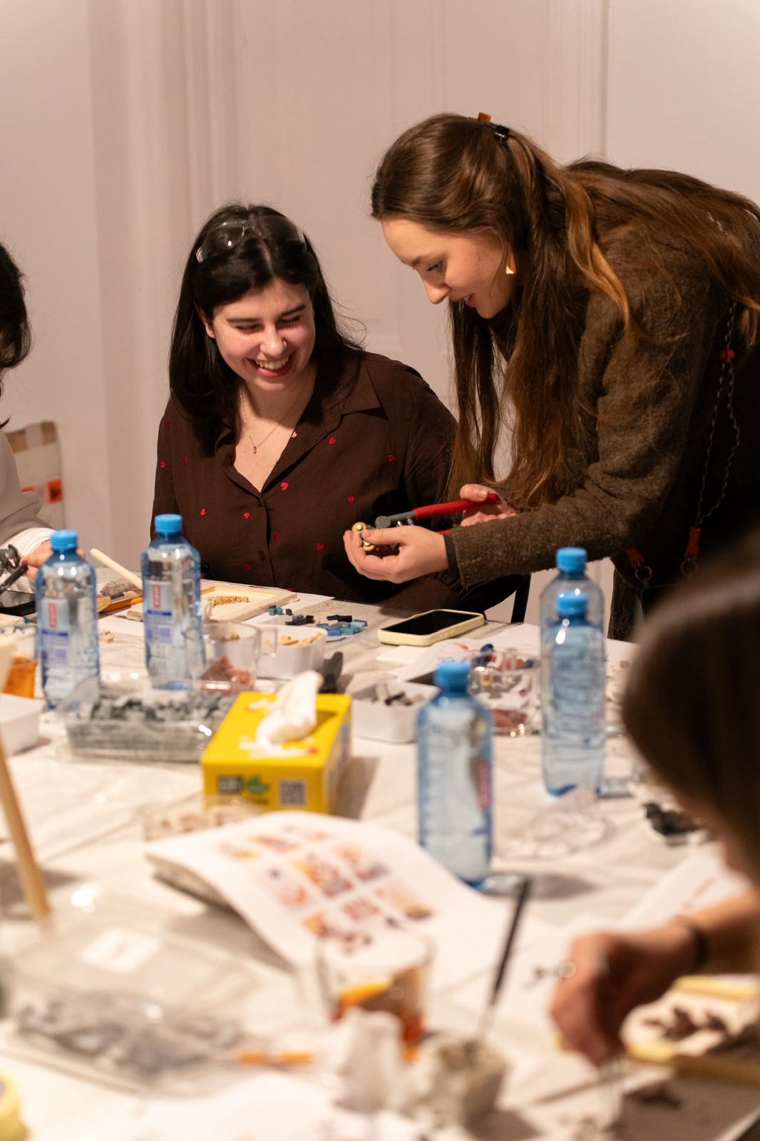 Finished mosaic artwork pieces featuring geometric and floral patterns